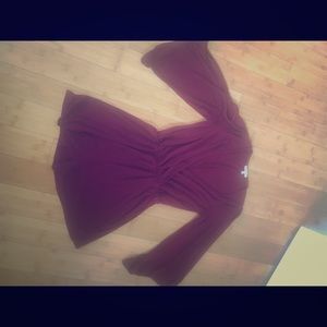 Wine colored romper peek-a-boo sleeves